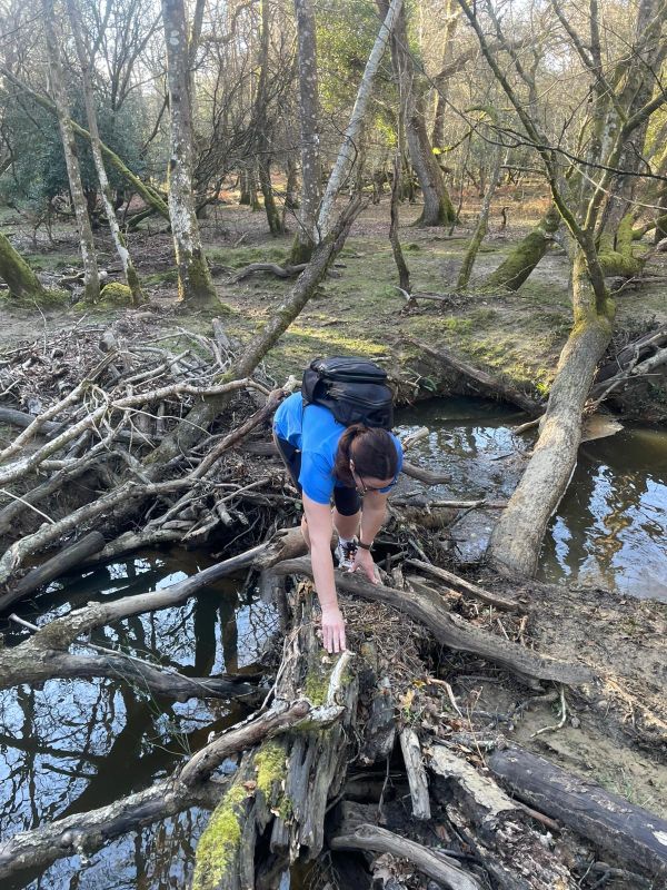 Katie crossing the river