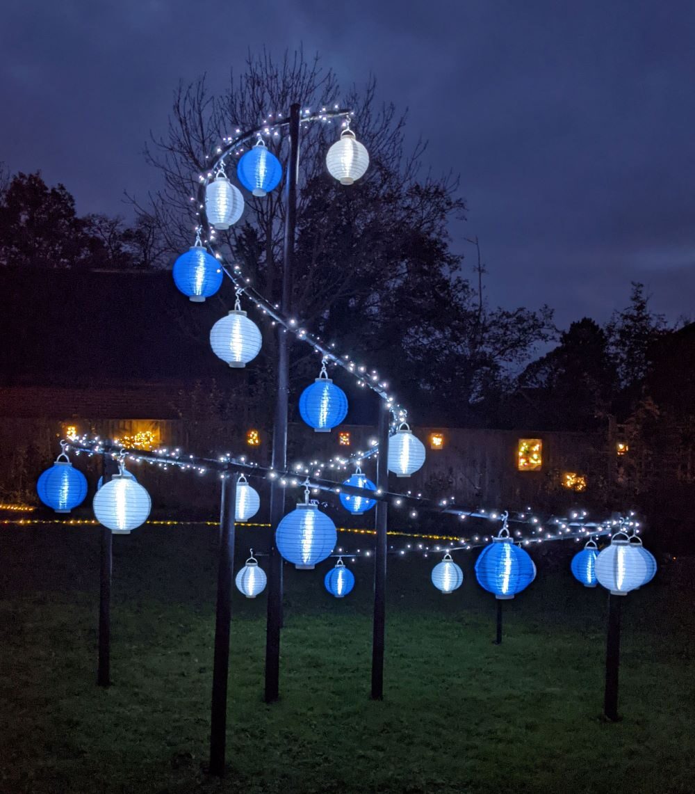 The garden at Colten Care’s Outstanding-rated Brockenhurst care home Woodpeckers is transformed into a ‘festival of light’ for residents and community visitors: the snail