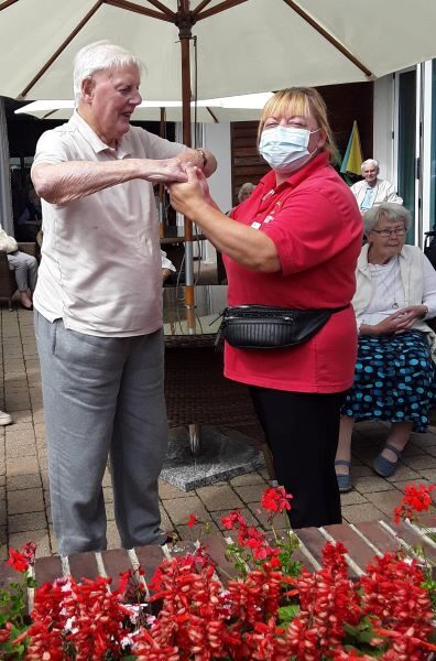 Kingfishers resident Geoff Lount and Companionship team member Sue Hawkins dancing to Geoff’s request, ABBA’s Thank You for the Music.