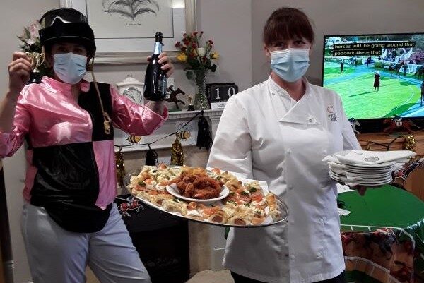 jokey with chef and sandwiches